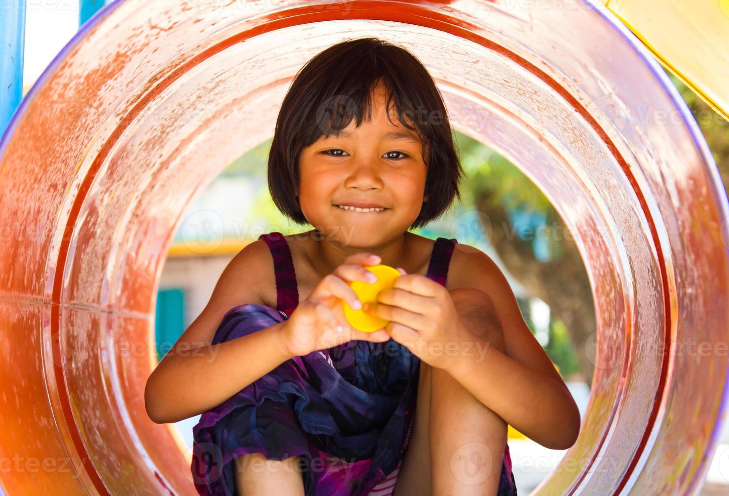 Girl sitting Playground photo