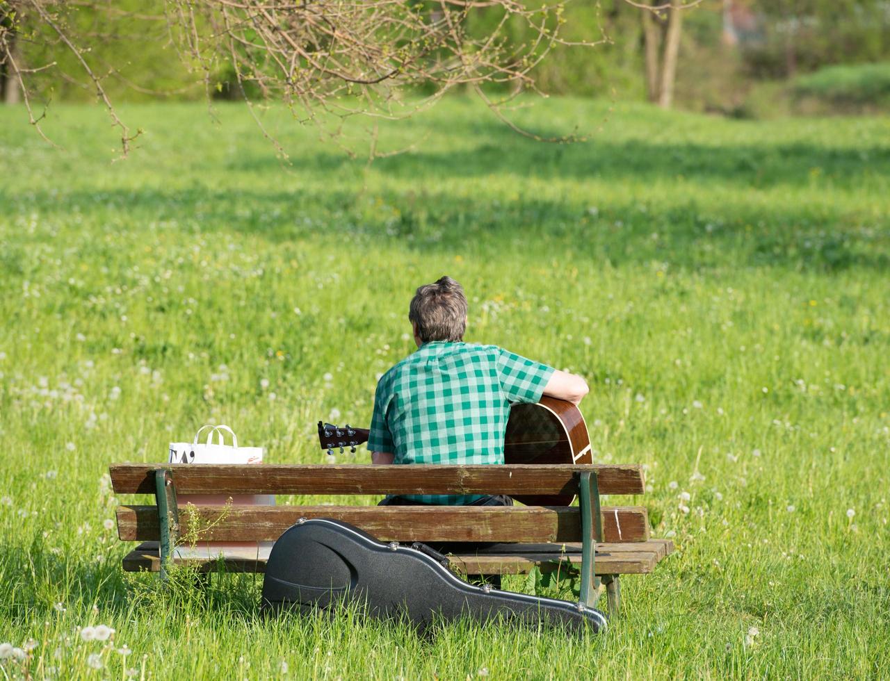 Bergamo Italy 2022 Musician playing in a field photo