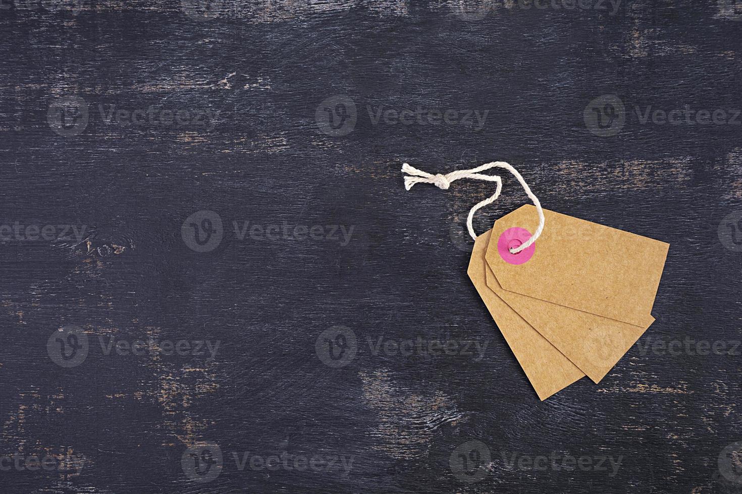 Blank label tag isolated on black background. Price tag. Sale concept. photo