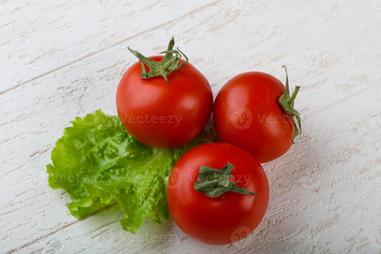 Red bright tomato photo