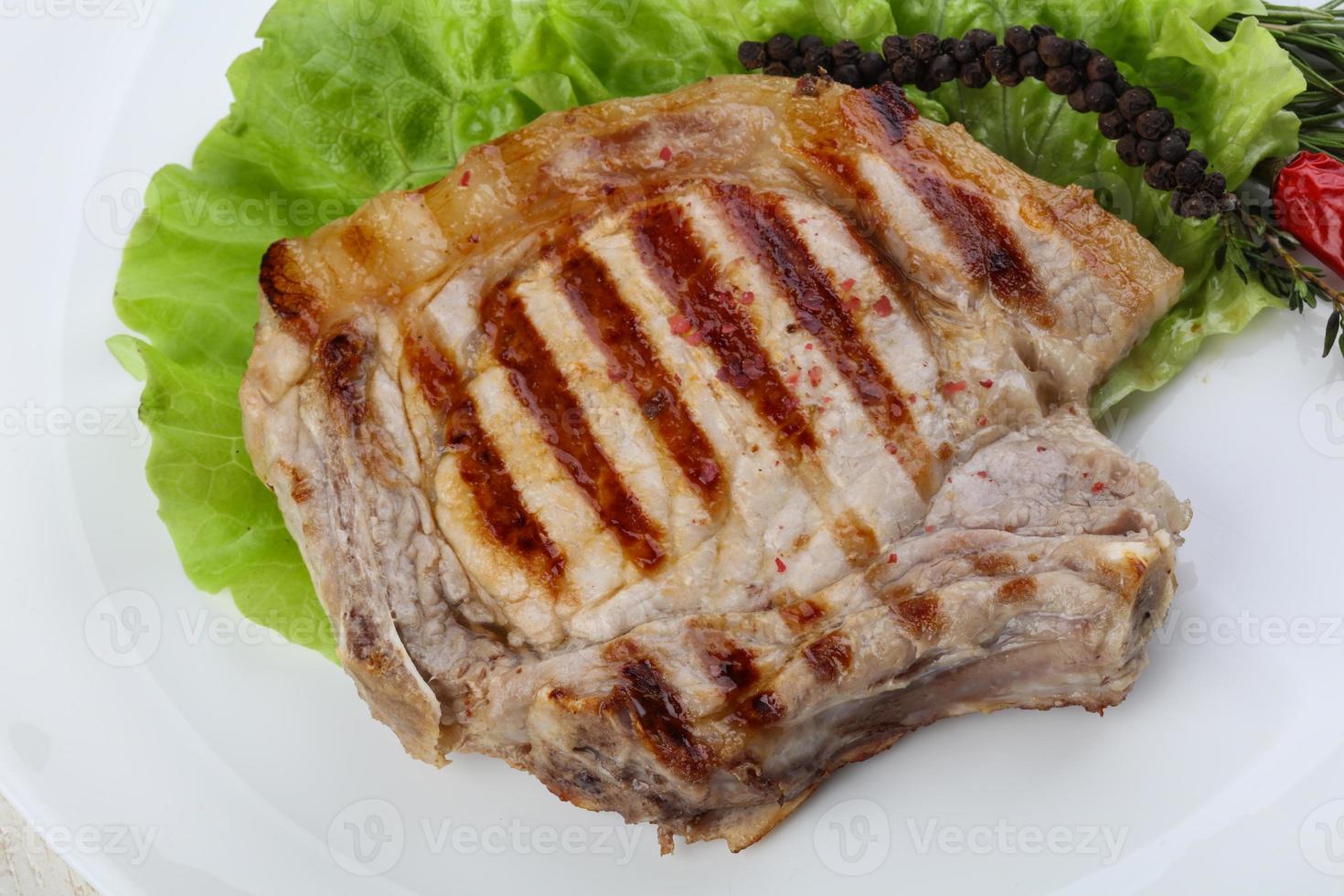 Grilled pork steak photo