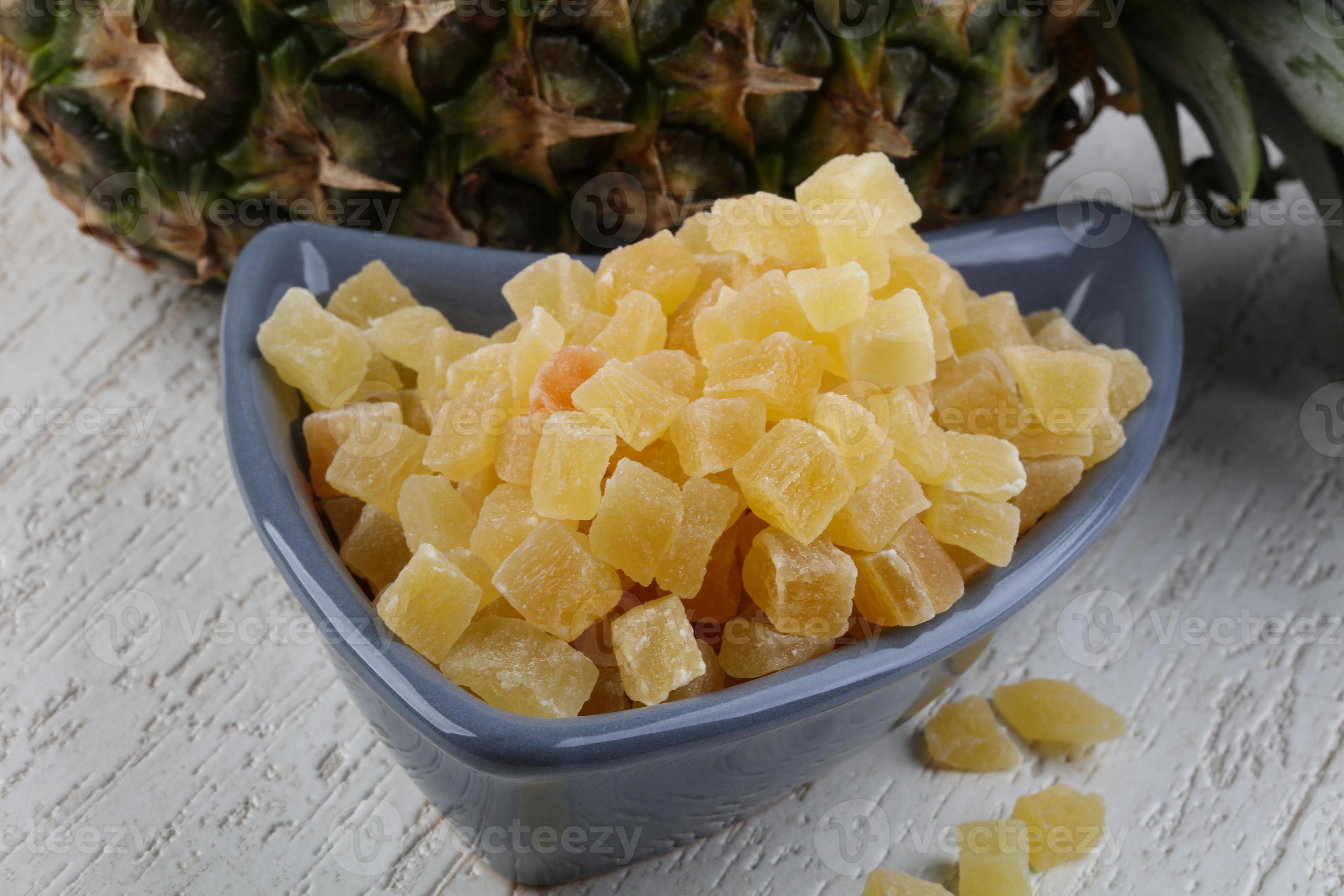 Dried pineapple in bowl 7700268 Stock Photo at Vecteezy