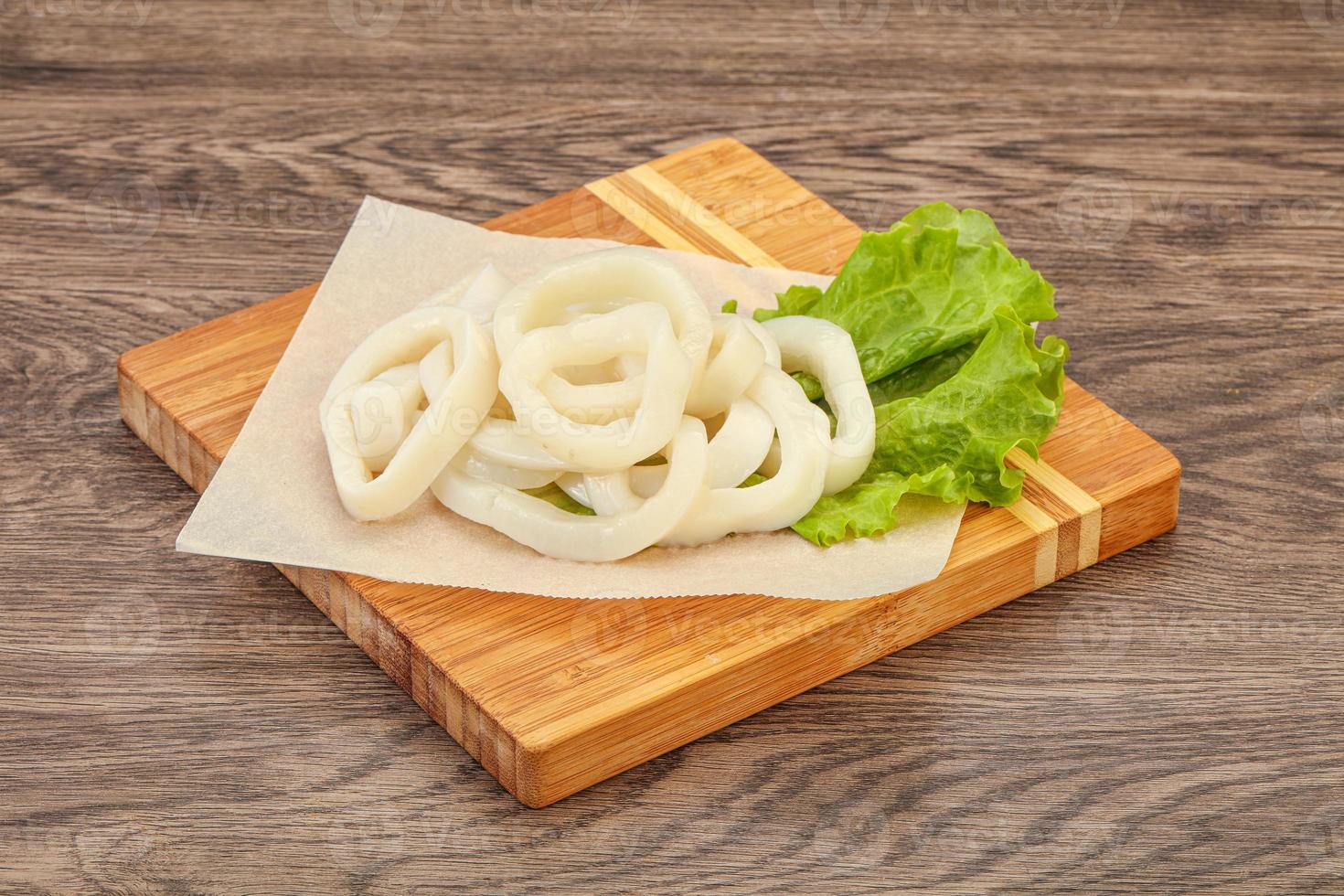 Raw squid rings for cooking photo