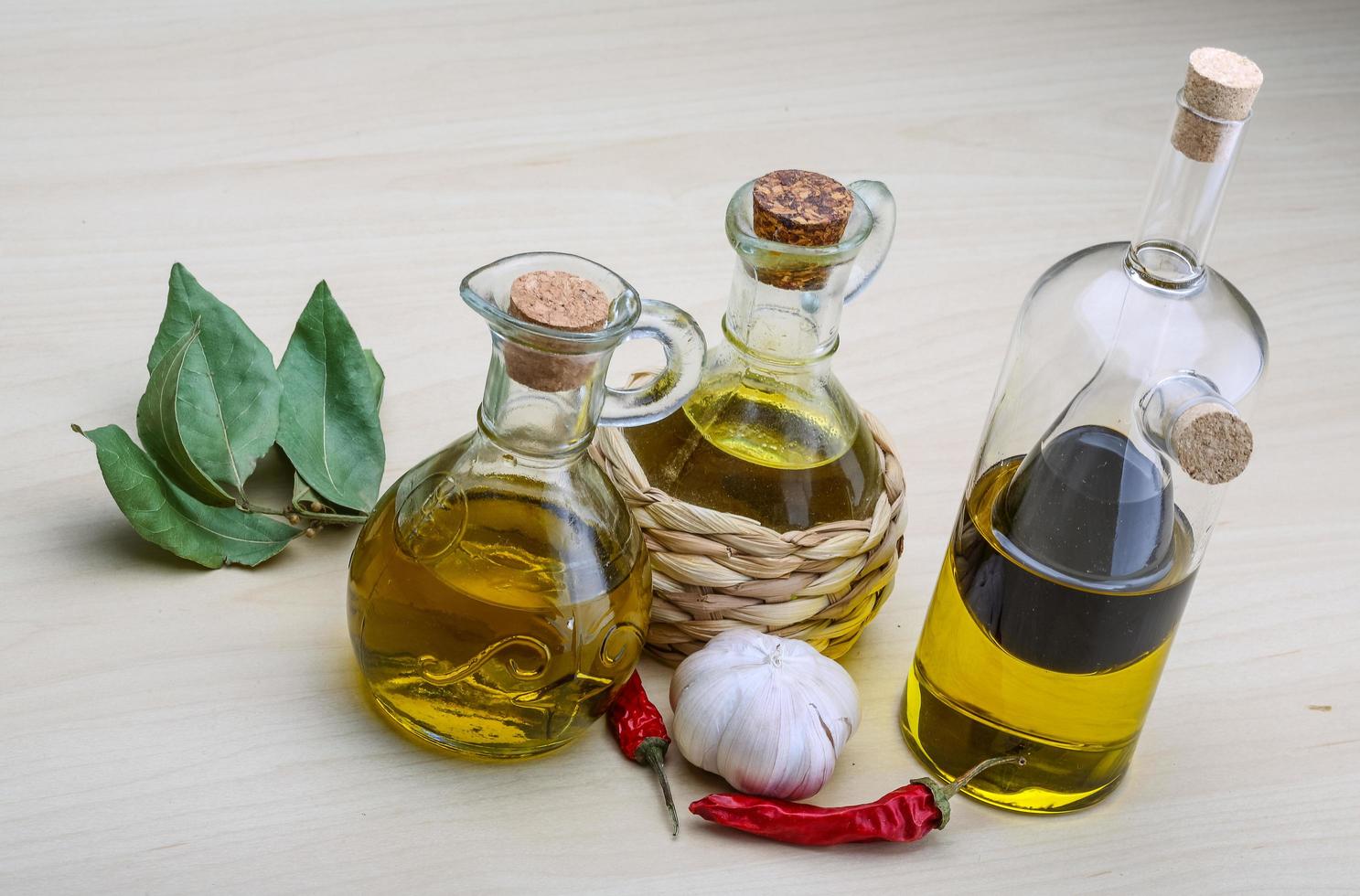 Olive oil in the bottles photo