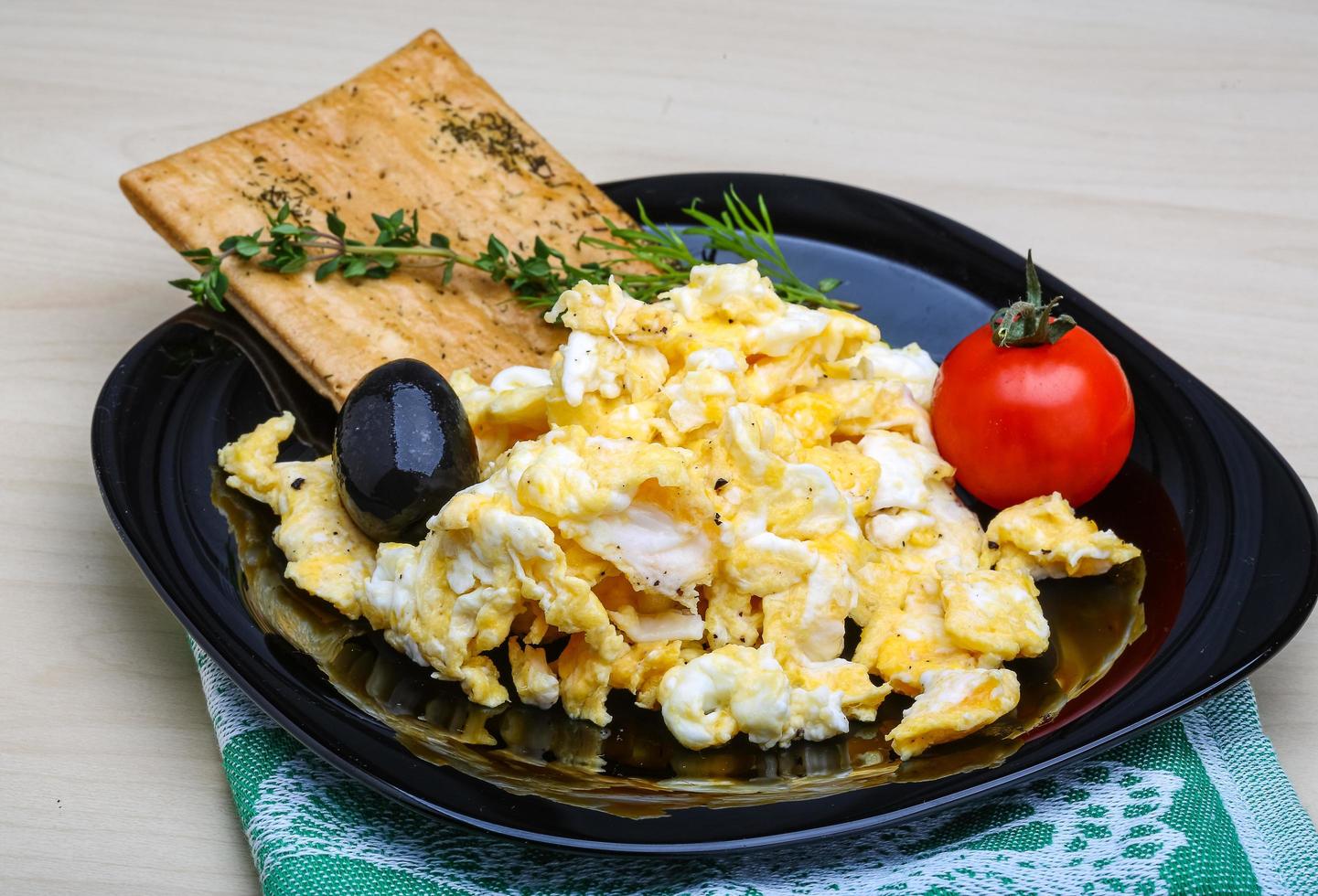 Scrambled eggs with tomato photo