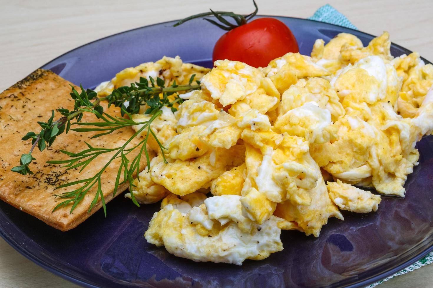 Scrambled eggs with tomato photo