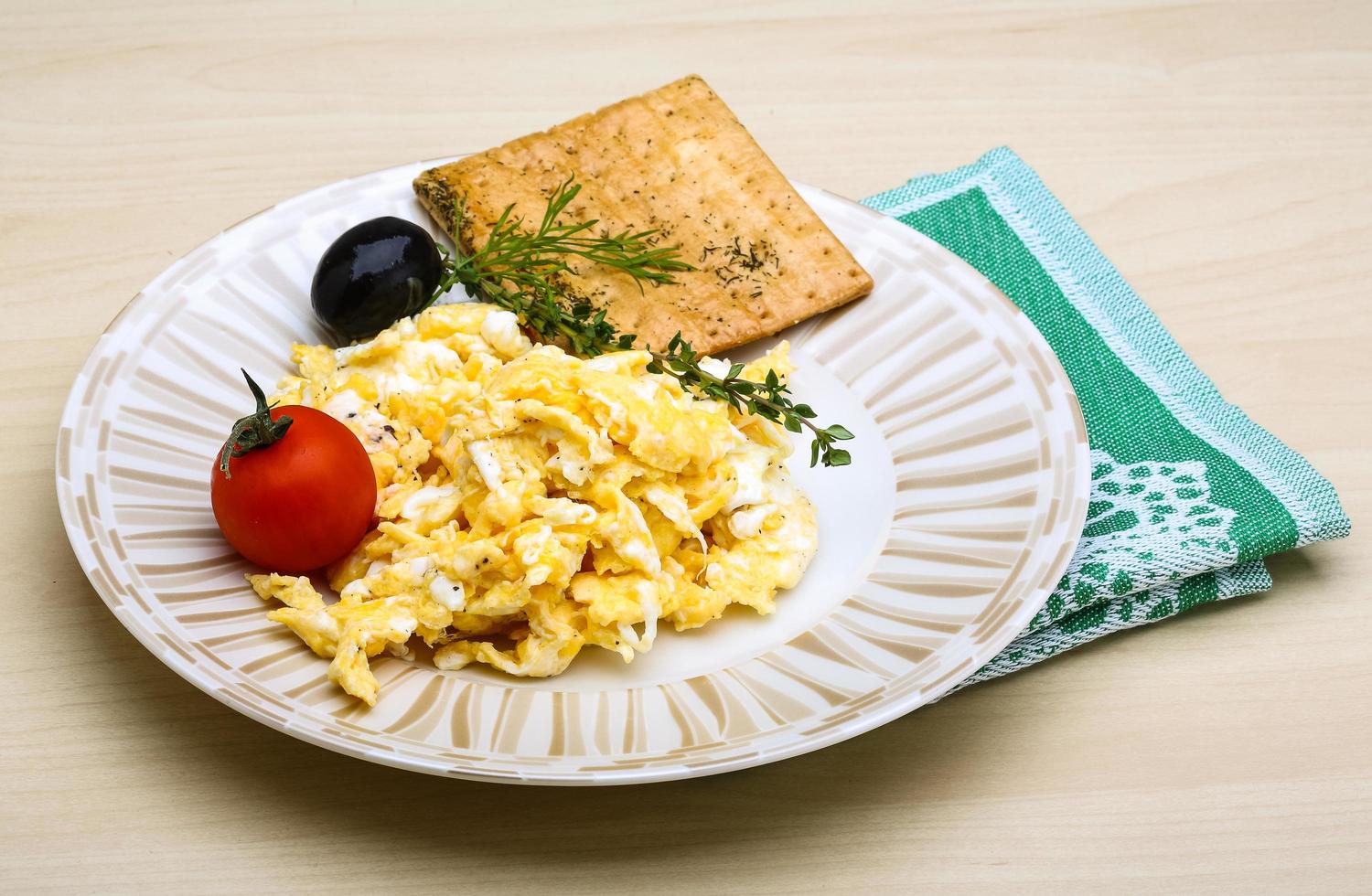 Scrambled eggs with tomato photo