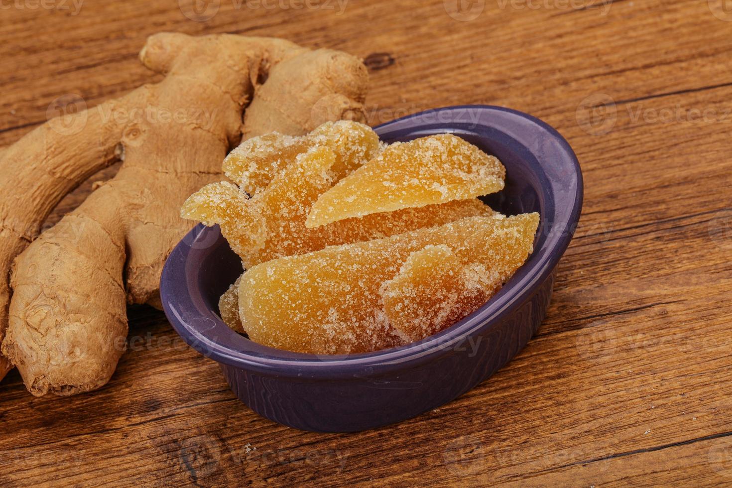 Dry sweet ginger in the bowl photo