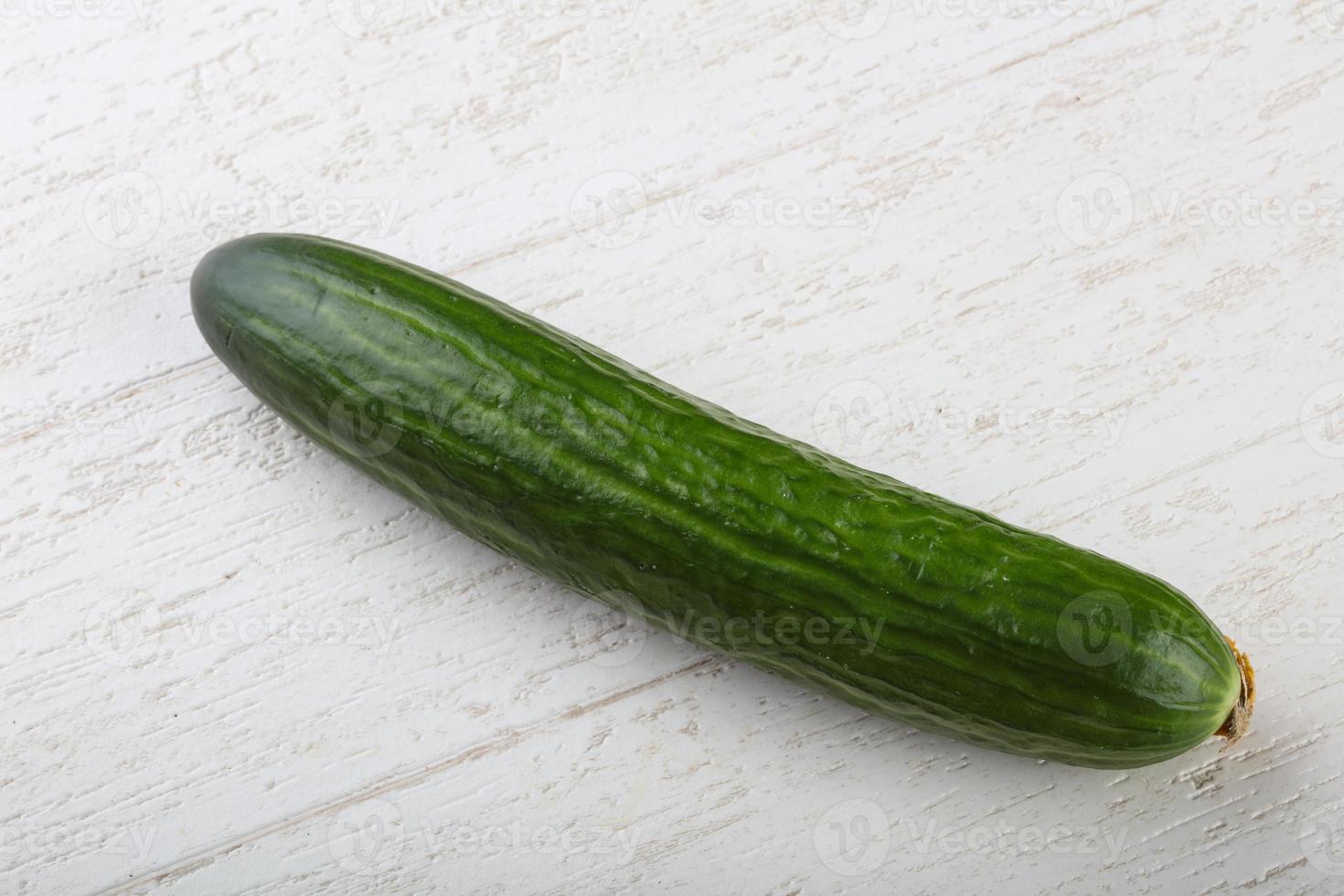 Cucumber on wood photo