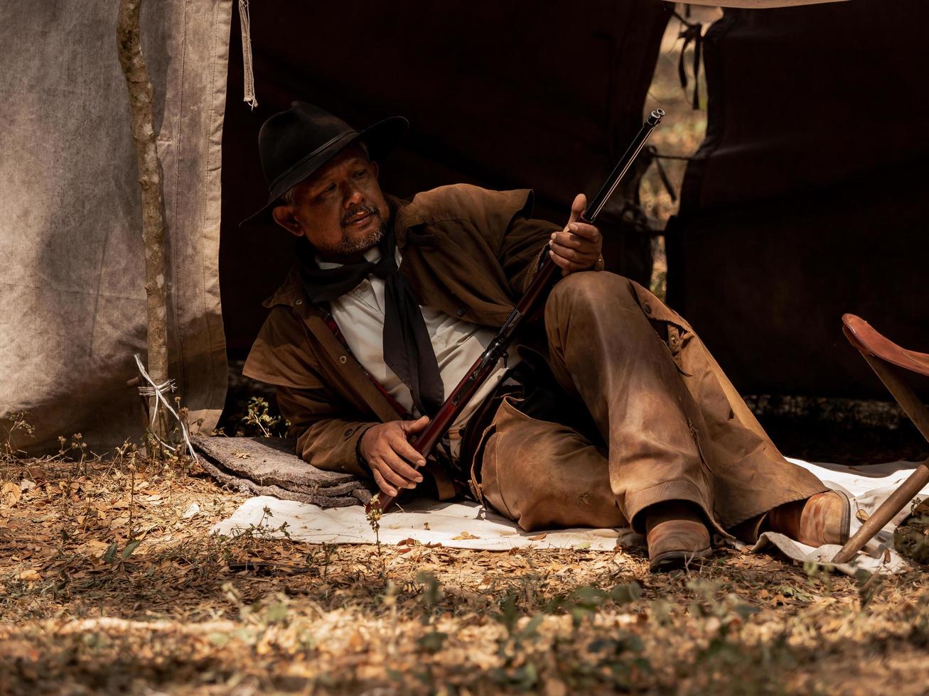 Senior cowboy are resting while protecting the safety of the camp in the western area. photo