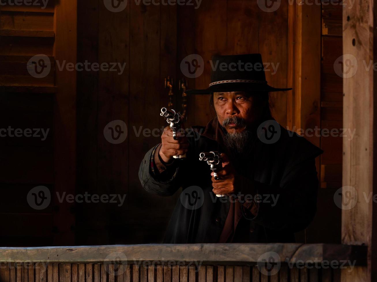 Western cowboys are using guns to fight to protect themselves in the tavern, On the land that the law has not yet reached photo