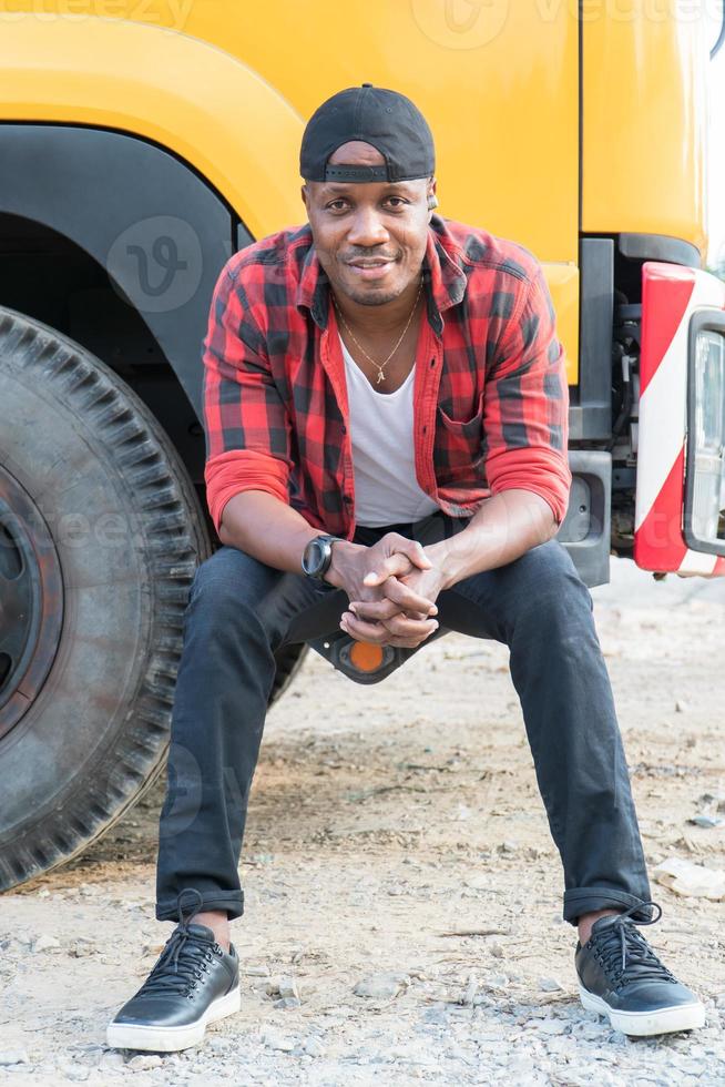 truck driver man smiling confident in insurance cargo transport photo