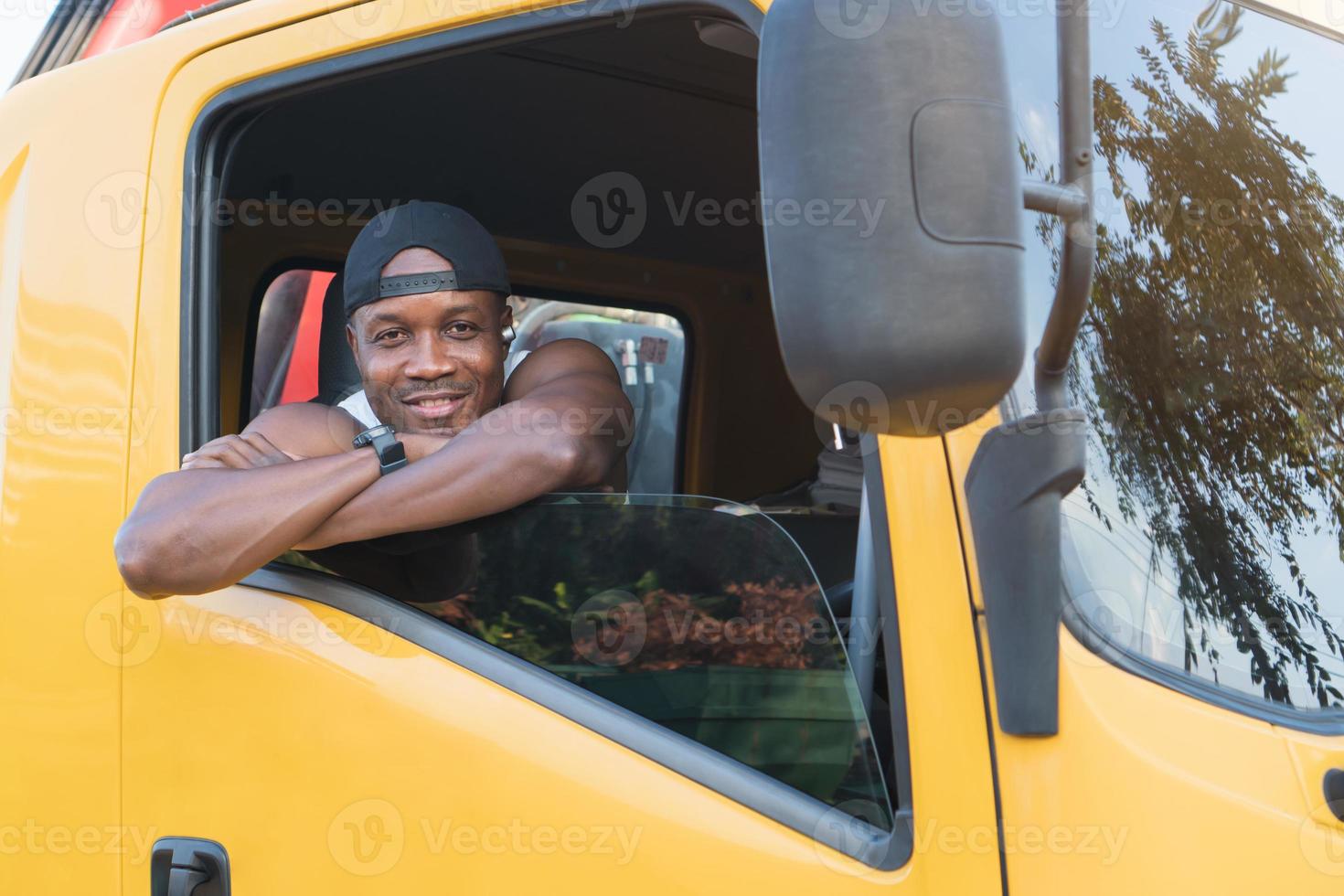 truck driver man smiling confident in insurance cargo transport photo