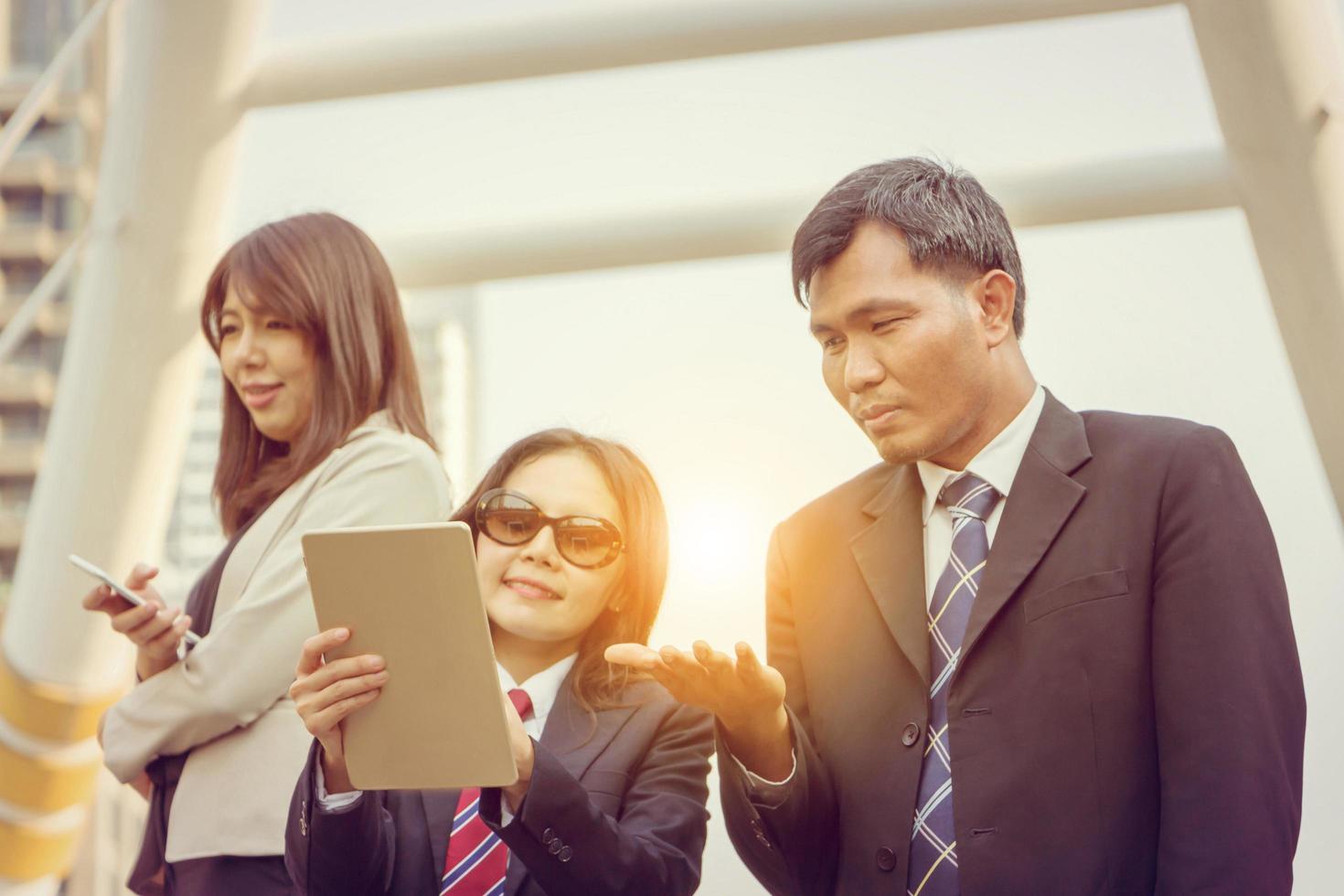 Group of Business people in a meeting discussing ideas, working outside office concept. photo