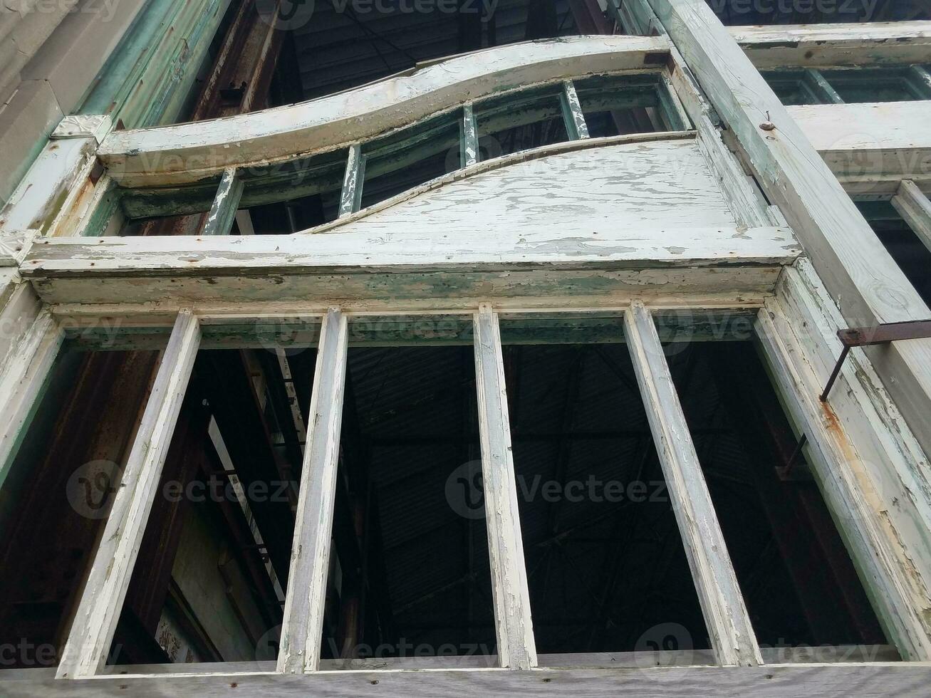 abandoned wood and metal building or structure or ruins photo