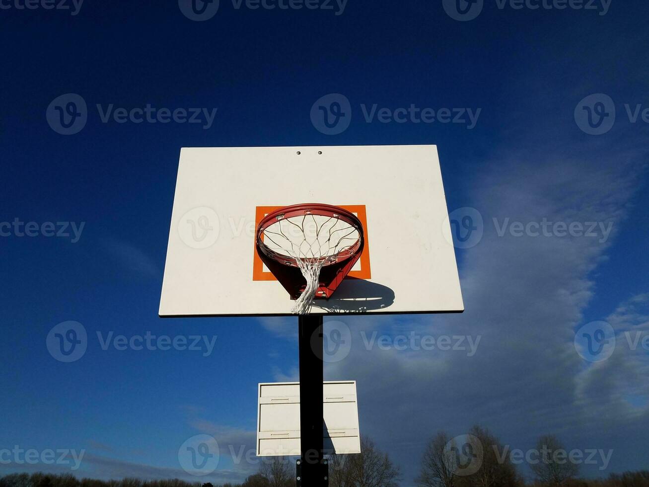 basketball hoop with backboard, rim, and net photo