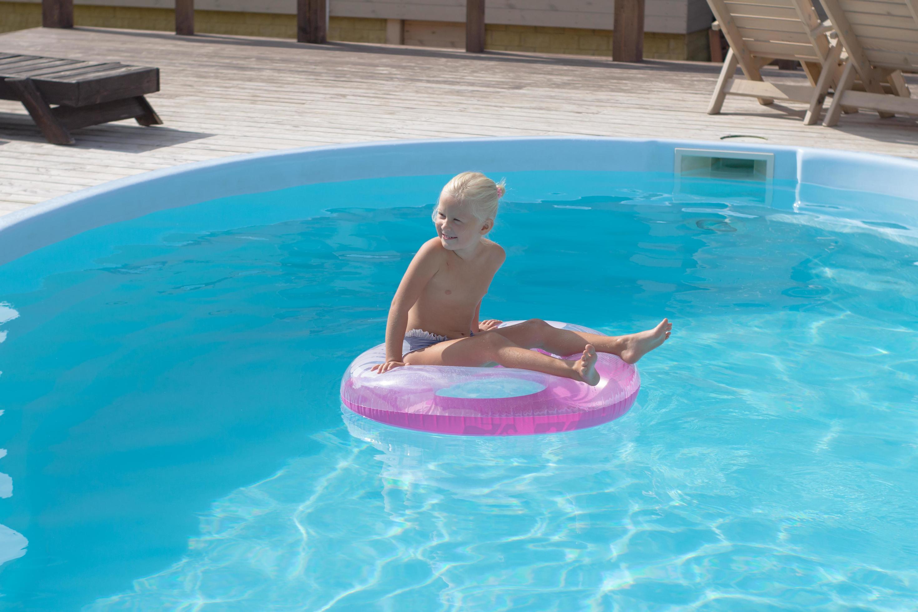 rajce bathing girl  Blonde kid having good time in pool, little girl swimm in sumertimes  7713653 Stock Photo at Vecteezy
