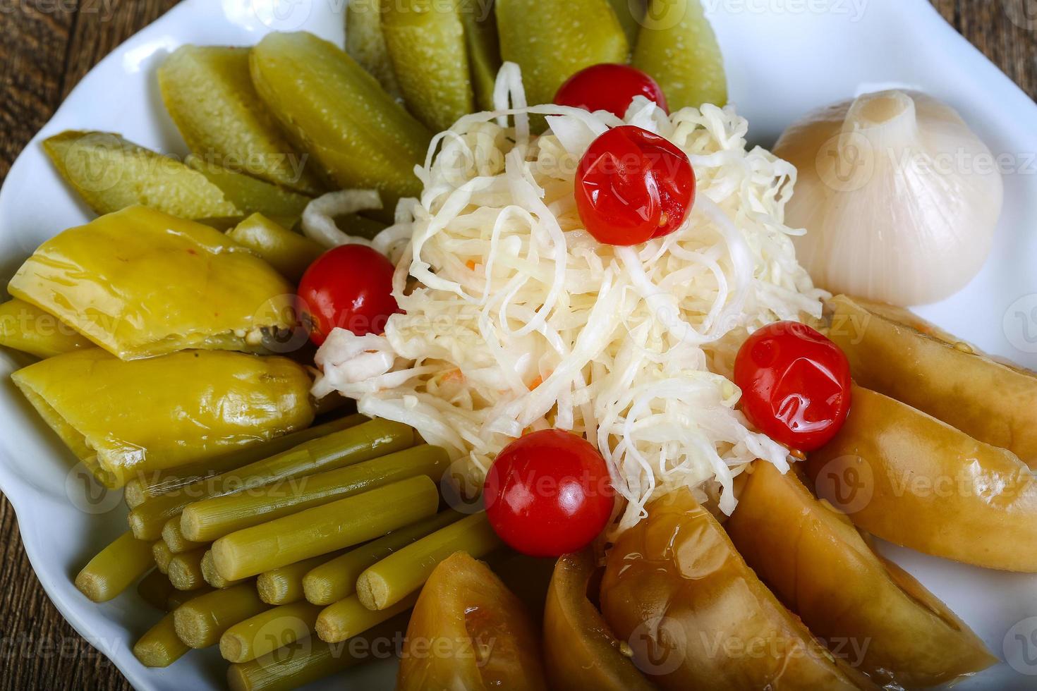 Pickled vegetables on plate photo