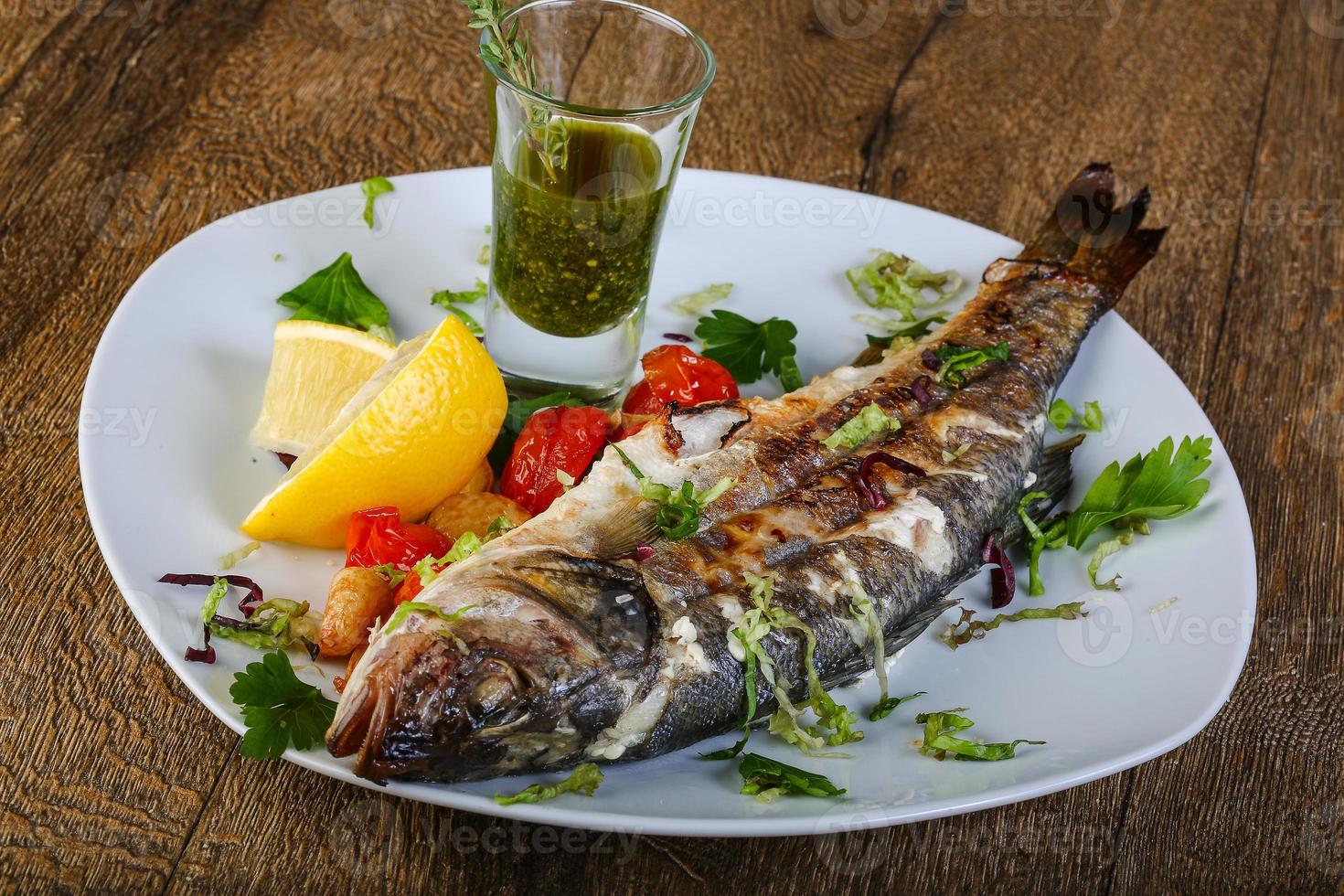 Grilled seabass on plate photo