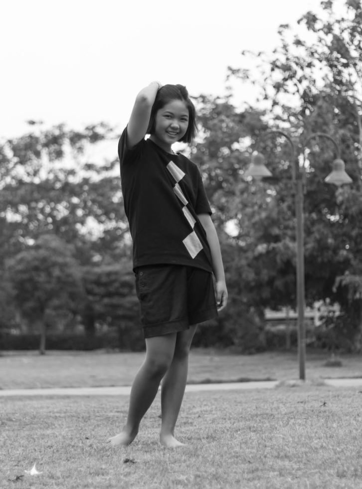 Black and white girl standing comfortably. photo