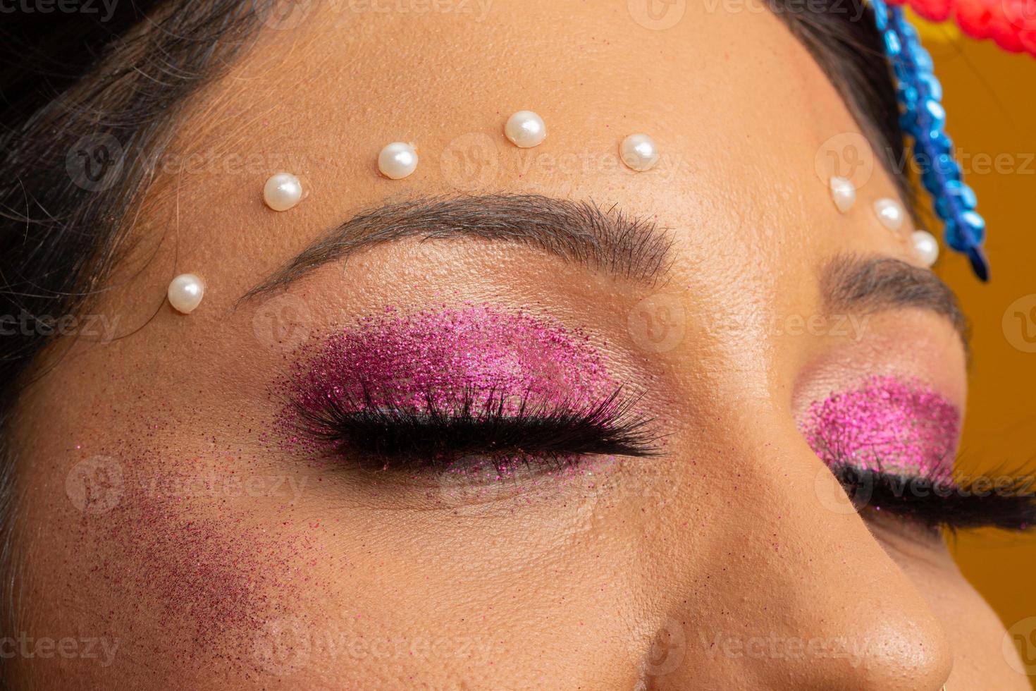 Carnival Makeup to celebrate Brazil's Carnaval. Makeup trend and accessories for the carnival. photo