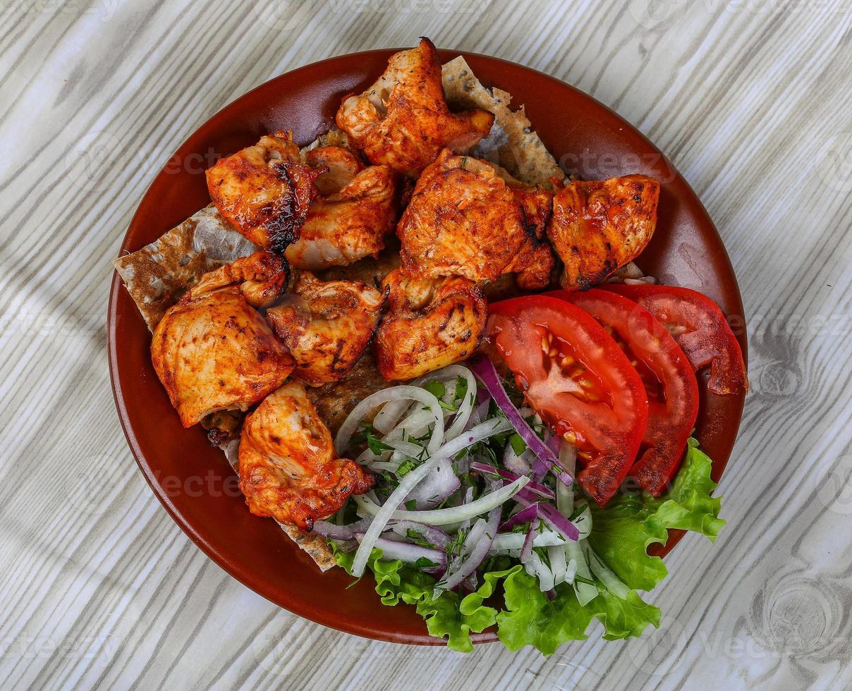 Chicken skewers dish photo