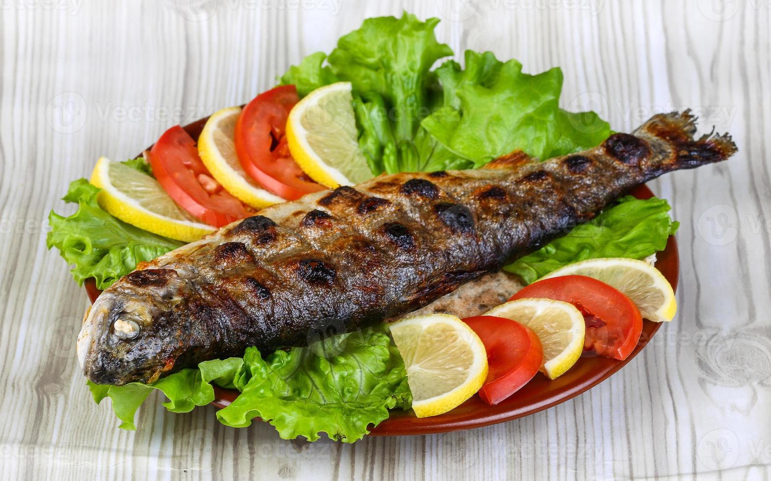Grilled trout dish 7720797 Stock Photo at Vecteezy