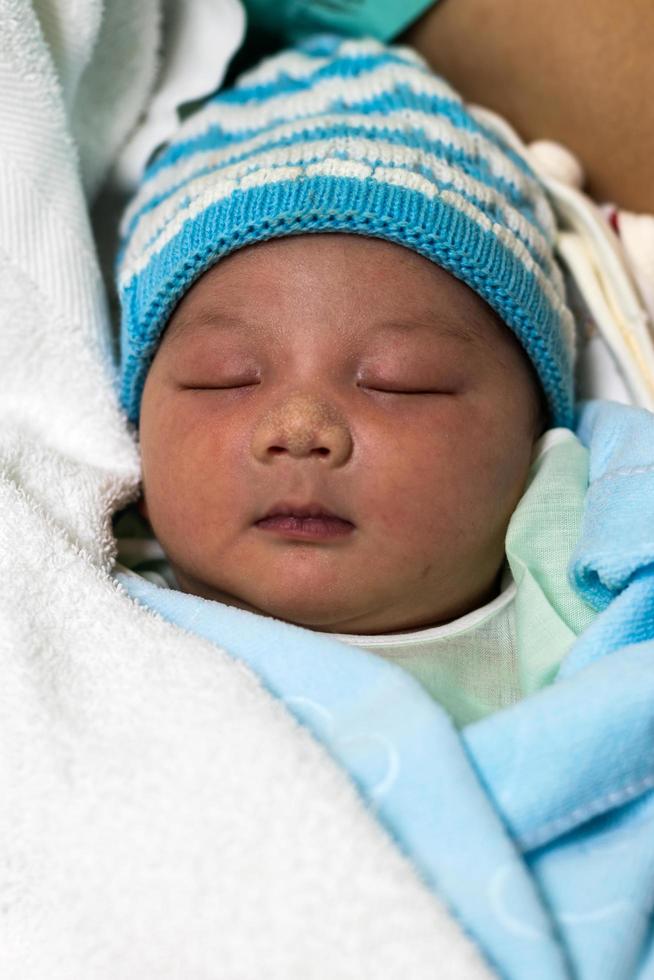 PHICHIT, THAILAND, FEBRUARY 26, 2020 Close-up of newborn Thai baby photo