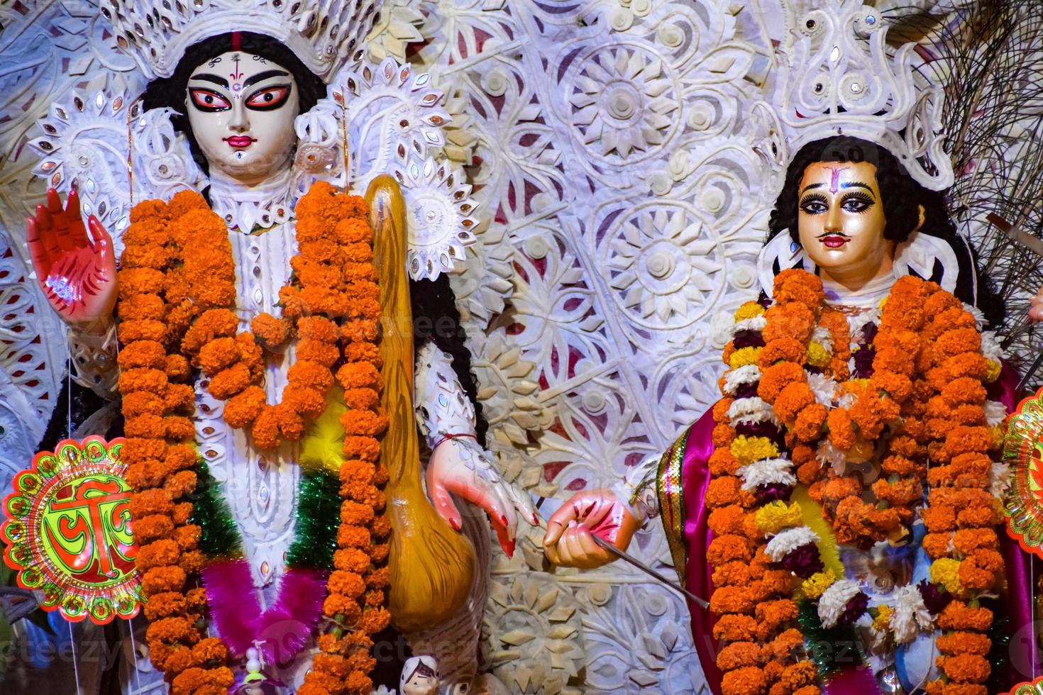 Goddess Durga with traditional look in close up view at a South Kolkata Durga Puja, Durga Puja Idol, A biggest Hindu Navratri festival in India photo