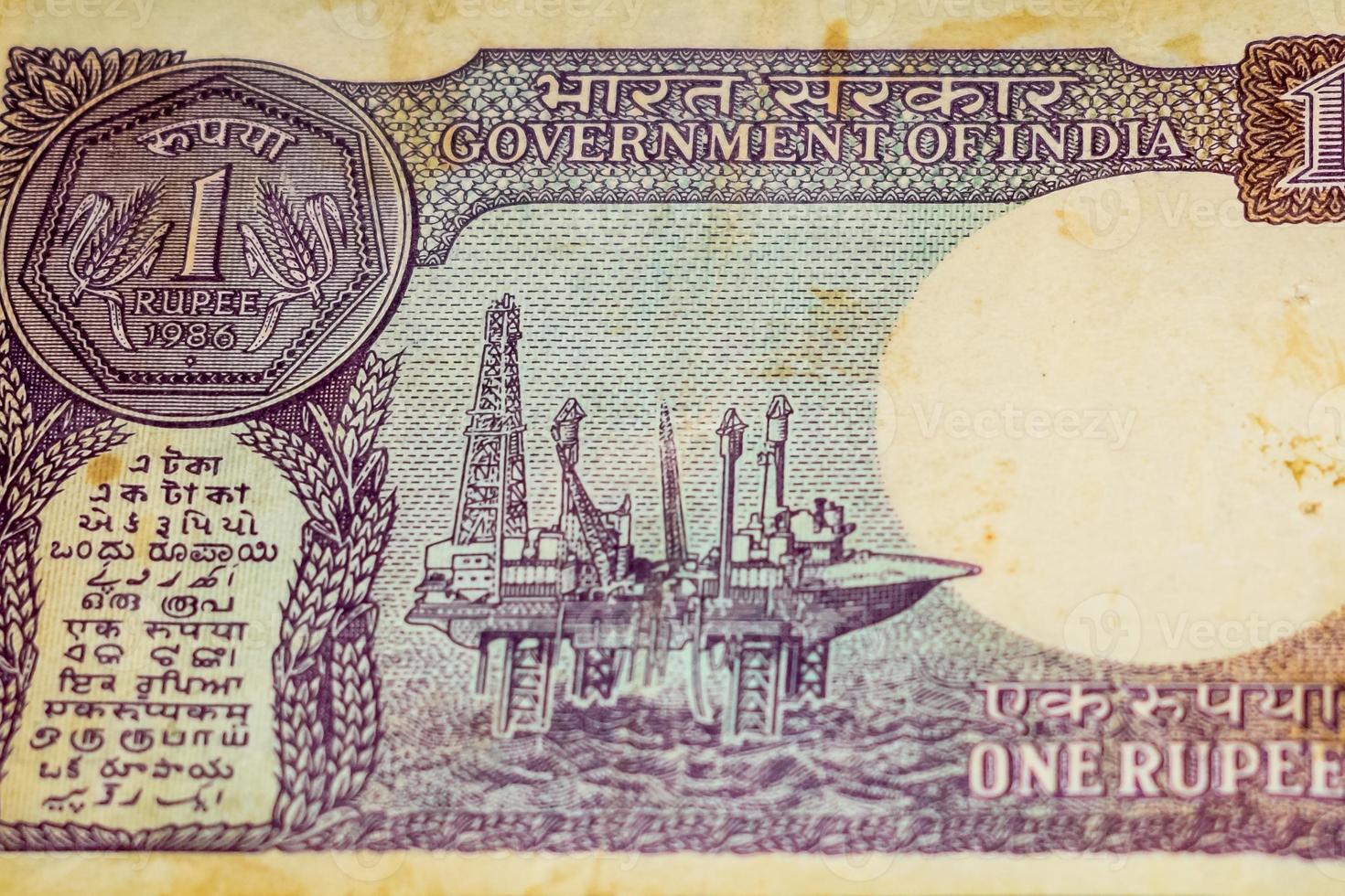 Old One Rupee notes combined on the table, India money on the rotating table. Old Indian Currency notes on a rotating table, Indian Currency on the table photo