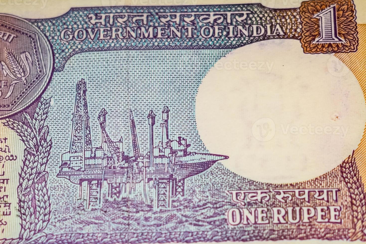 Old One Rupee notes combined on the table, India money on the rotating table. Old Indian Currency notes on a rotating table, Indian Currency on the table photo