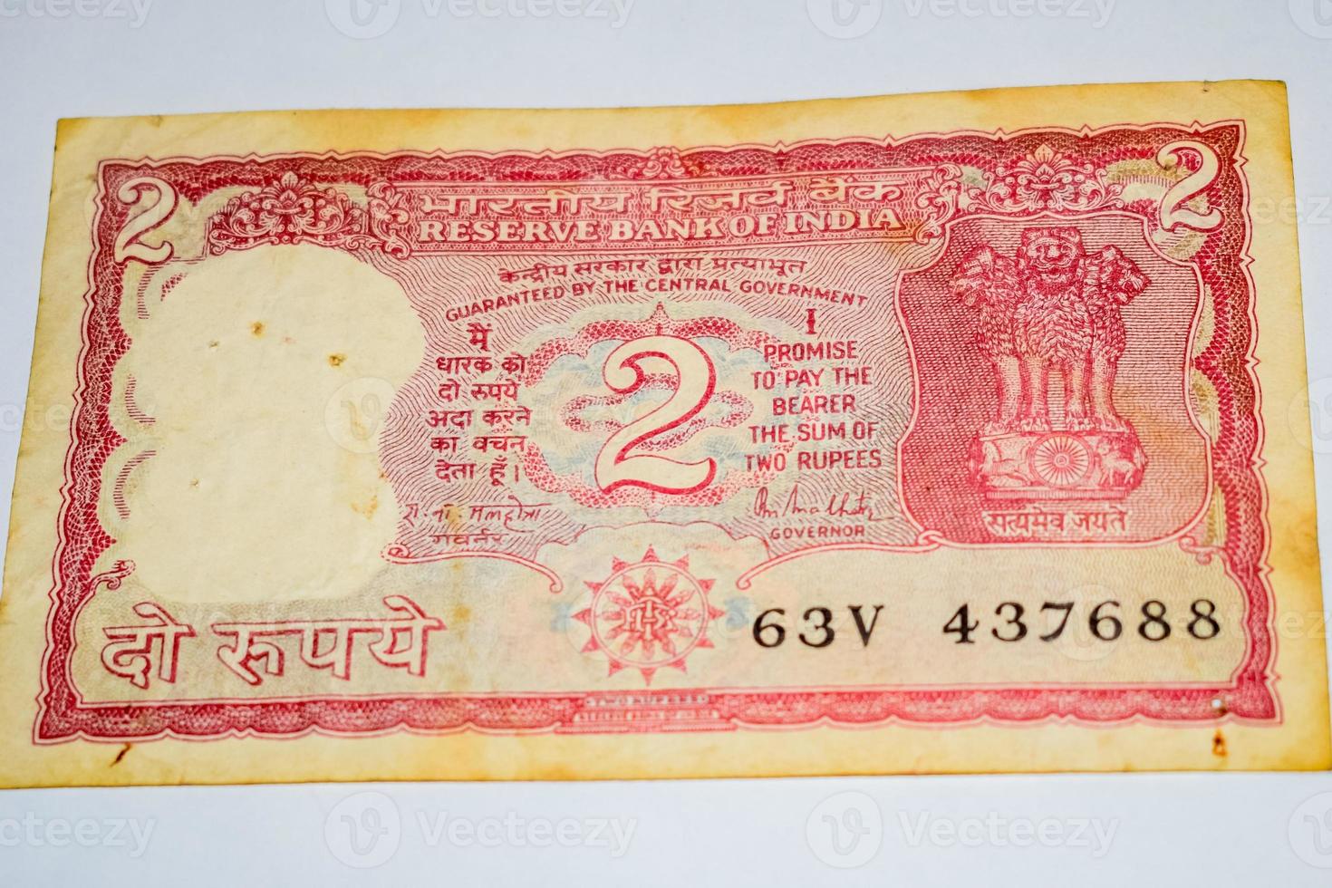 Old Two Rupee notes combined on the table, India money on the rotating table. Old Indian Currency notes on a rotating table, Indian Currency on the table photo