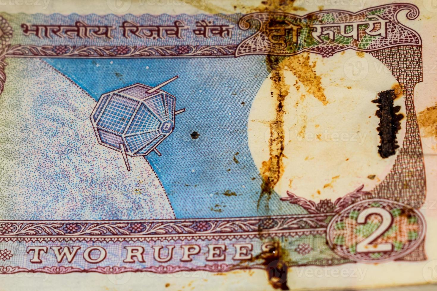 Old Two Rupee notes combined on the table, India money on the rotating table. Old Indian Currency notes on a rotating table, Indian Currency on the table photo