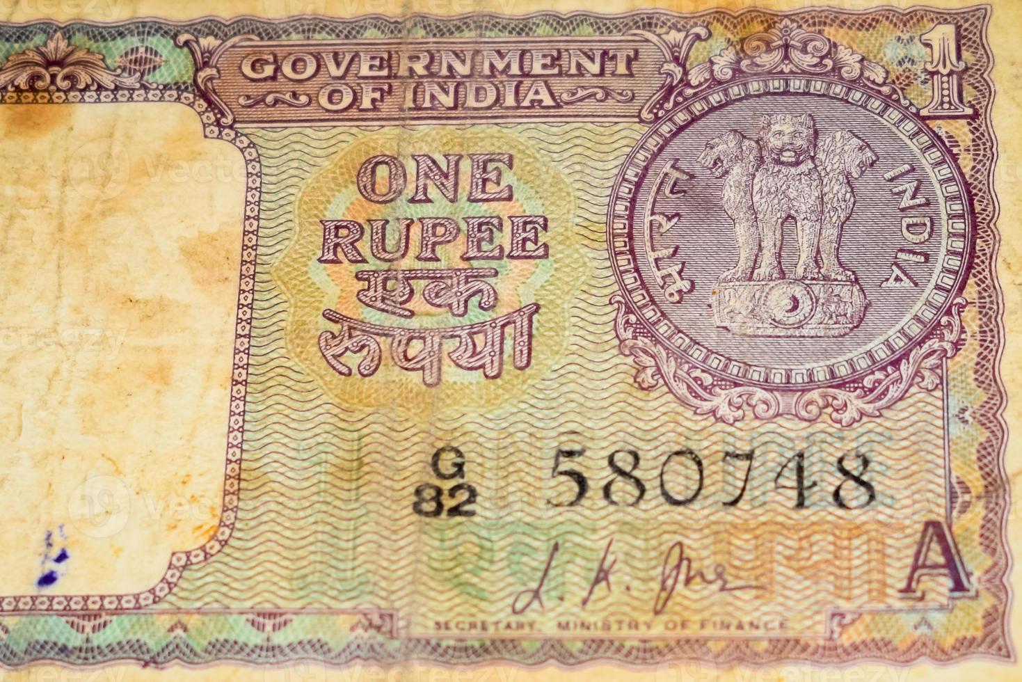 Old One Rupee notes combined on the table, India money on the rotating table. Old Indian Currency notes on a rotating table, Indian Currency on the table photo