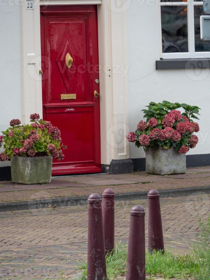 Zutphen at the river Ijssel in the netherlands photo