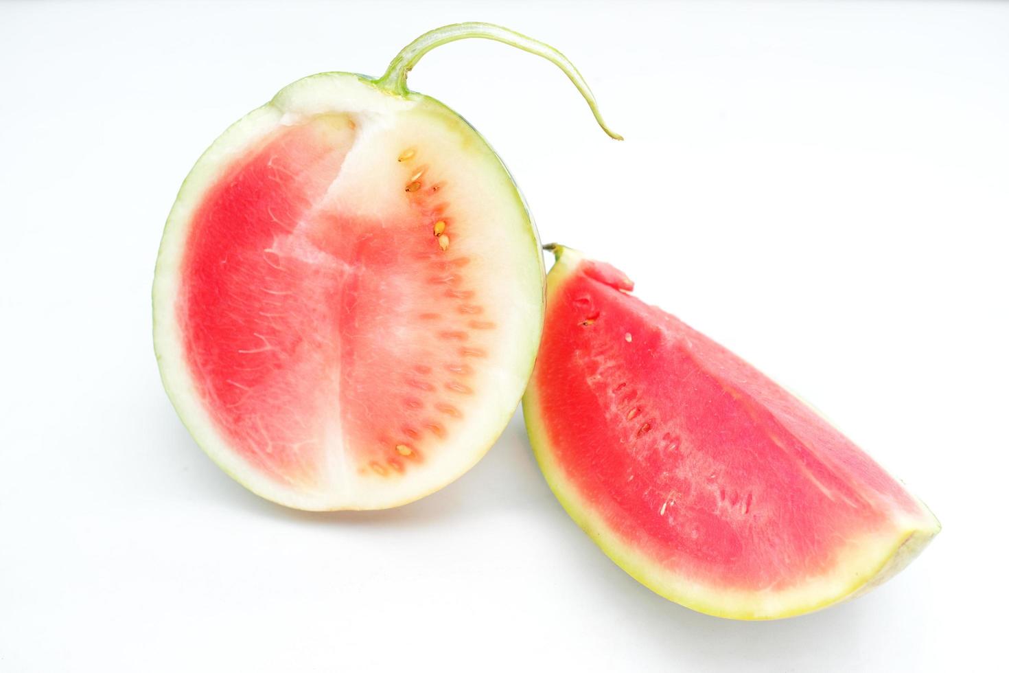 Ripe Watermelon - sliced red ripe watermelon on a white background photo