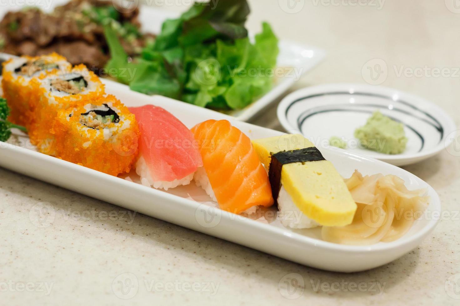 sushi on white plate photo