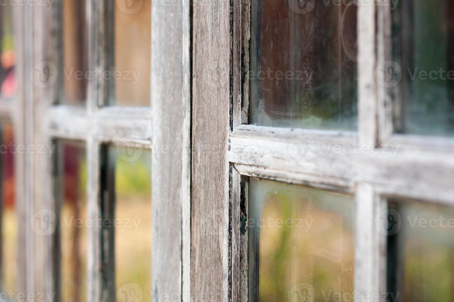 Very old grunged wooden window photo