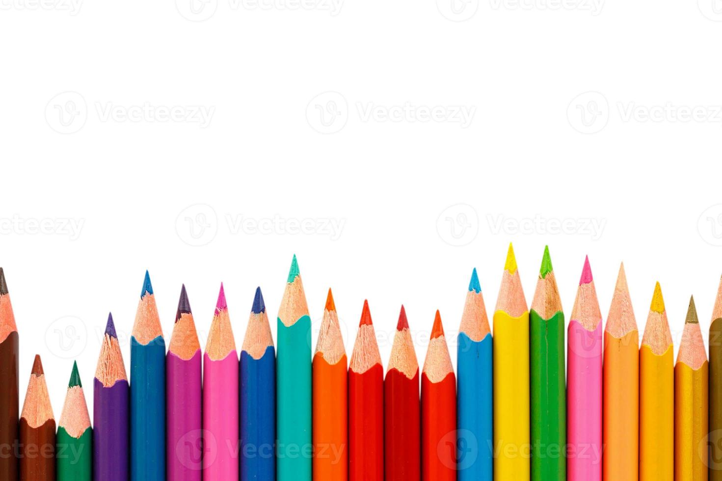 Colour pencils isolated on white background photo