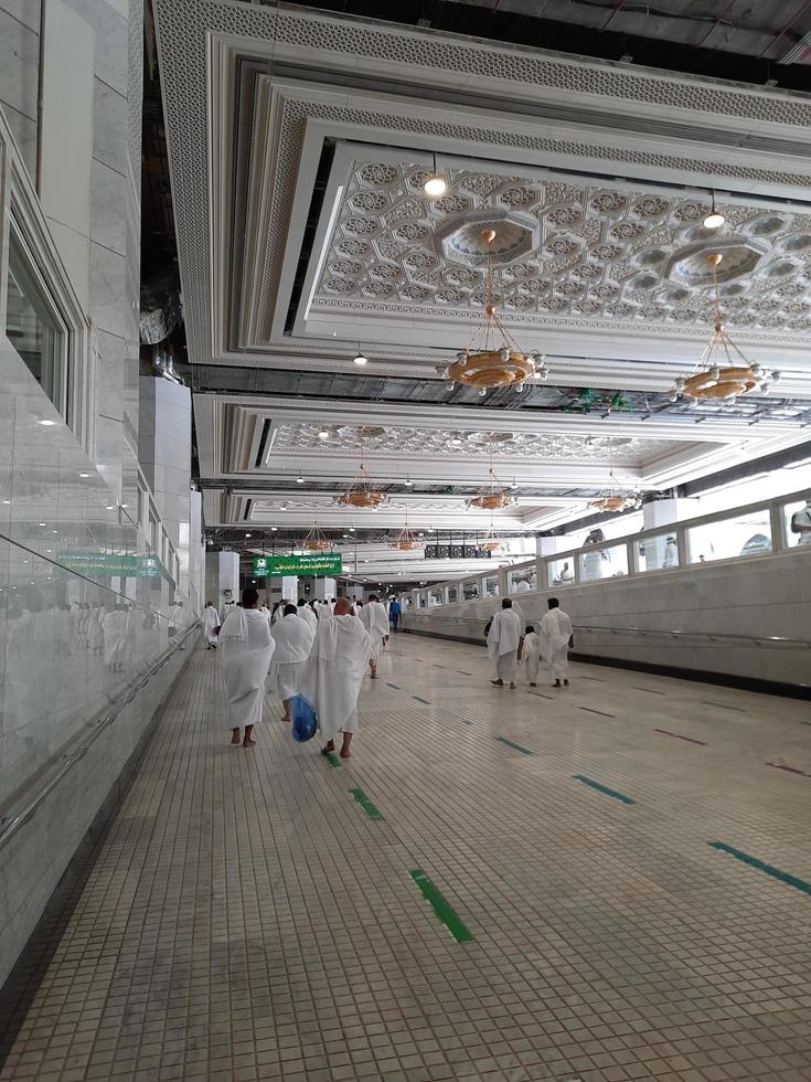 Mecca, Saudi Arabia, May 2022 - Umrah pilgrims are going for a Sai between Safa and Marwah after circumambulating the Kaaba. photo