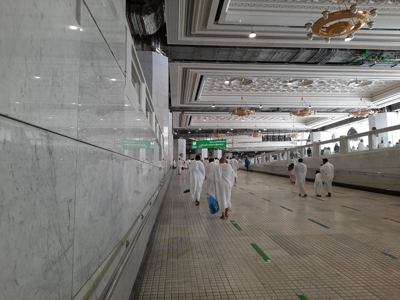 Mecca, Saudi Arabia, May 2022 - Umrah pilgrims are going for a Sai between Safa and Marwah after circumambulating the Kaaba. photo