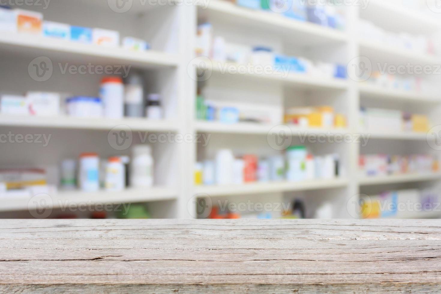 pharmacy product display counter with drugstore shelves photo