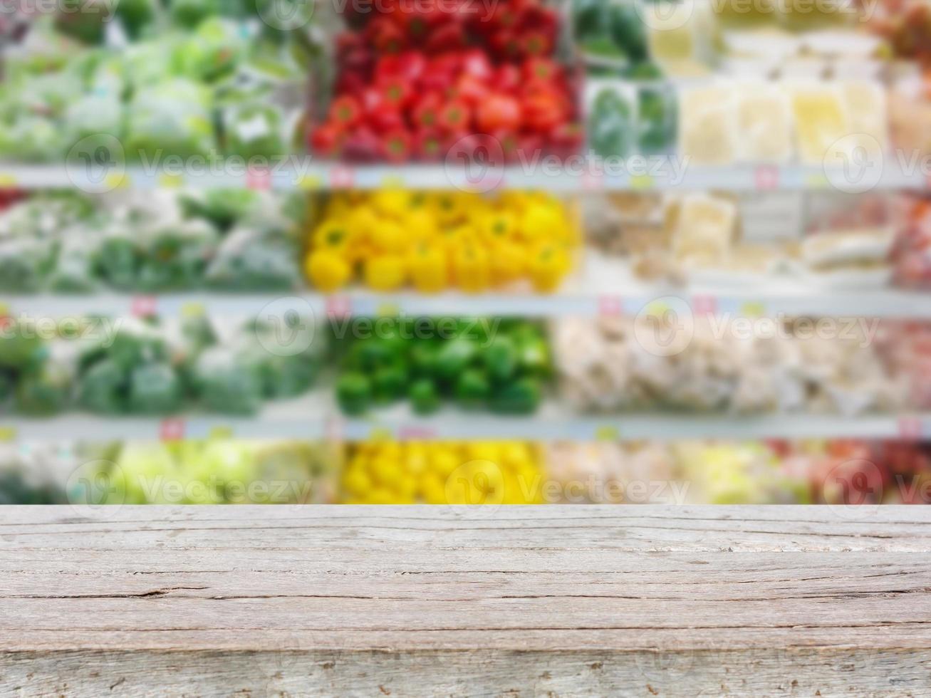 Vegetables on shelf in supermarket photo