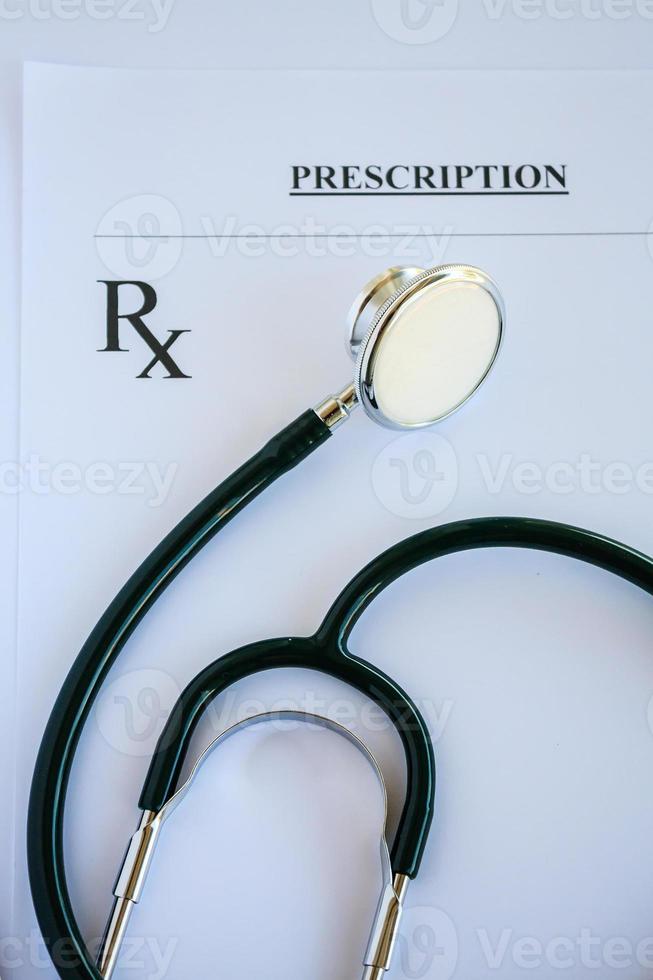 Blank medical prescription with stethoscope photo