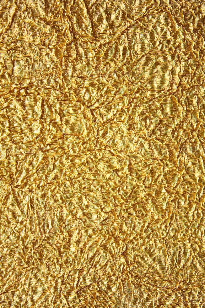 Shiny gold texture crumpled background photo