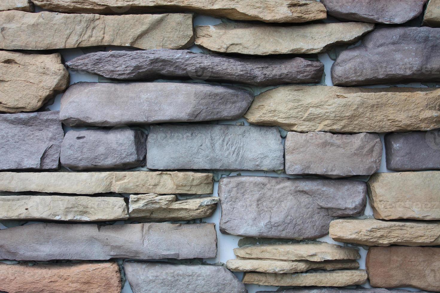 pattern of decorative slate stone wall background texture photo