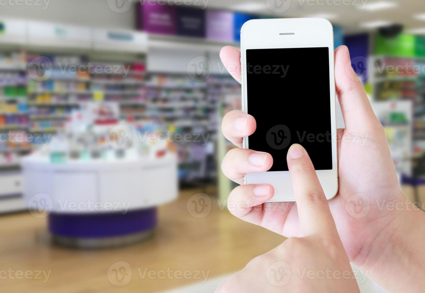 blur shelves of healthcare product in supermarket photo