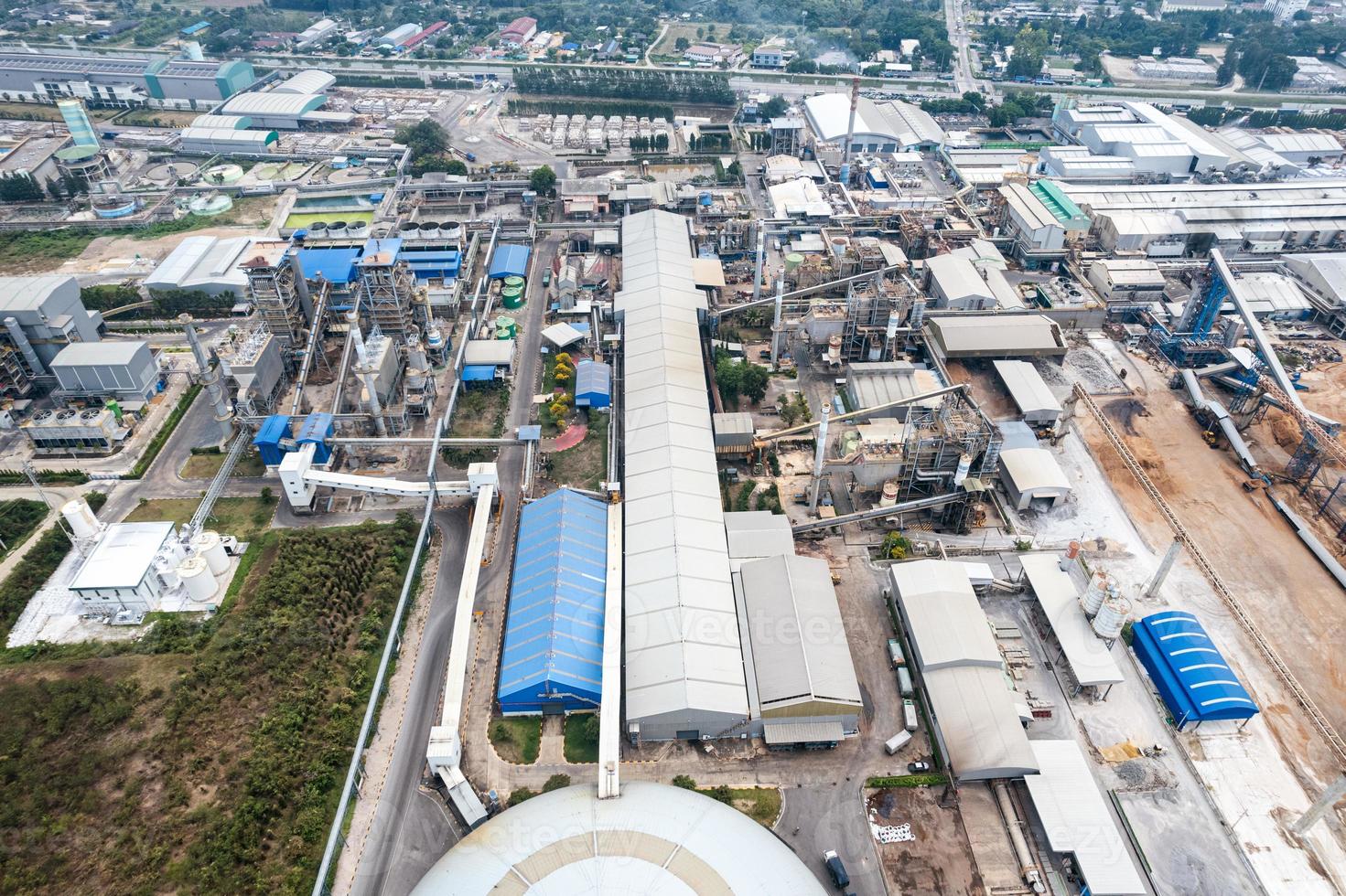 Aerial view of building infrastucture of industry power plant, smart chamical, gas and oil refinery pipeline warehouse photo