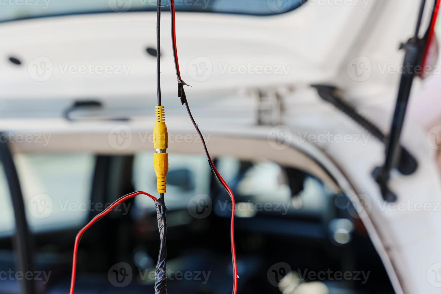 Plug connection with copper wire wrapped in tape installing rear view camera photo