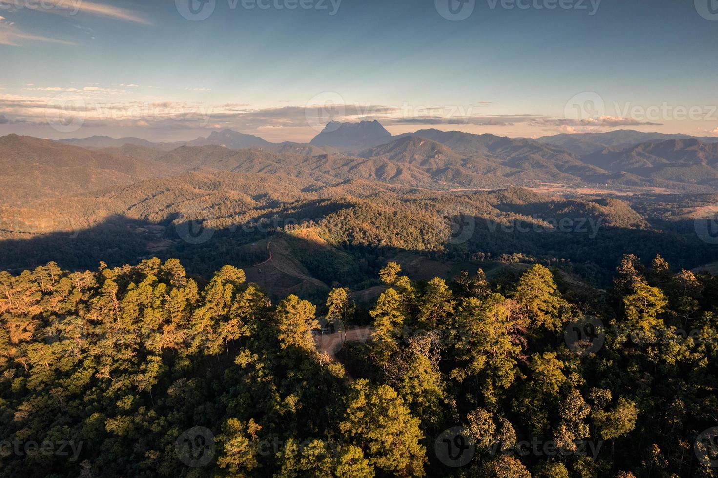 Aerial view of Doi Luang Chiang Dao mountain in tropical rainforest on national park at evening photo